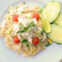Crab Fried Rice · Fried rice with crab meat, egg, onions, and tomatoes.