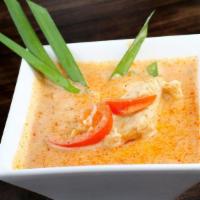 Panang Curry · Panang curry paste in coconut milk, peanut sauce with bell pepper.
