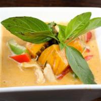 Pumpkin Curry · Red curry paste in coconut milk, bell pepper, kabocha pumpkin, and basil.