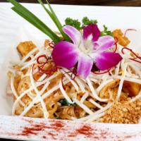 Pad Thai Veggie · Pan fried rice noodles with vegetables, tofu, bean sprouts, ground peanuts and egg.