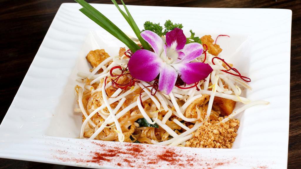 Pad Thai Veggie · Pan fried rice noodles with vegetables, tofu, bean sprouts, ground peanuts and egg.