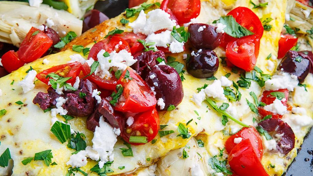 Mediterranean Style Omelette · Olives, feta cheese, tomatoes, spinach & chives.