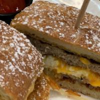 Loaded French Toast Sticks Sandwich · Filled with egg, and cheese, a turkey patty.