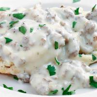 Biscuits & Gravy · Two fresh baked biscuits smothered in country gravy