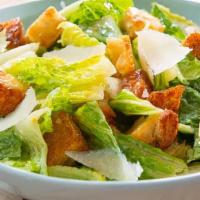 Side Dinner Caesar Salad · Romaine lettuce, parmesan cheese, Caesar dressing & croutons.