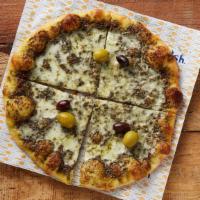 Zaatar & Cheese · Pita dough, zaatar and extra virgin olive oil, cheese mix, kalamata olives, green olives.