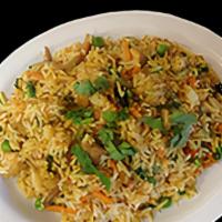 Chicken Biryani · Boneless chicken thigh meat blended and cooked with a choice of white basmati or brown rice.