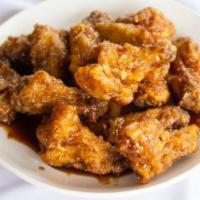 House Chicken · Sweet and crispy Chicken wing.