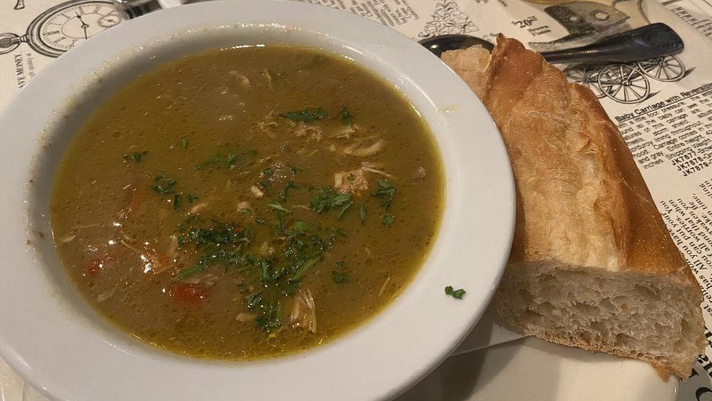 Thai Chicken Curry Soup · A pub favorite; our homemade curry, simmered with shredded chicken, rice and vegetables.