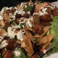 Pepe Salad · Crispy lettuce, pico de gallo, chopped tortillas, black beans, and deep fried chicken nugget...