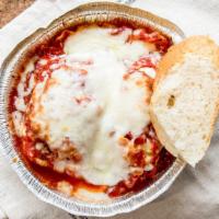 Baked Lasagna · served with bread and butter.