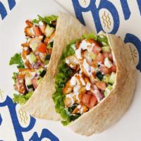 Chicken Kabob · Served on pita with tomato, onion, and lettuce. Comes with your choice of one side.