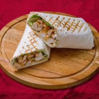 Classic Chicken Gyro Wrap · Char-grilled chicken gyro meat wrapped to perfection with fresh veggies. Comes with white sa...