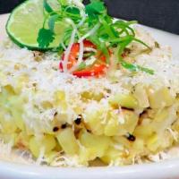 ESQUITES · Grilled brentwood white corn, habanero aioli, cotija, pepitas & fresno chilis