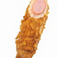 Cornflake Dog · Our cornflake dog consists of all beef hotdog, covered in cornflakes.<br /><br />*Sauce will...