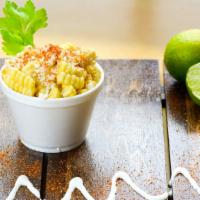 Corn in A Cup · Corn in a cup toppedMayonnaise, cotija cheese and chili.