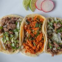 Tacos · Whole beans, onion, cliantro, radishes on the side and tomatillo sauce.(NO GREEN SAUCE)