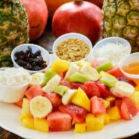 Energy Fruit Salad · Fruit with cottage cheese, granola, coconut, raisins, honey, and seasonal fruit.
