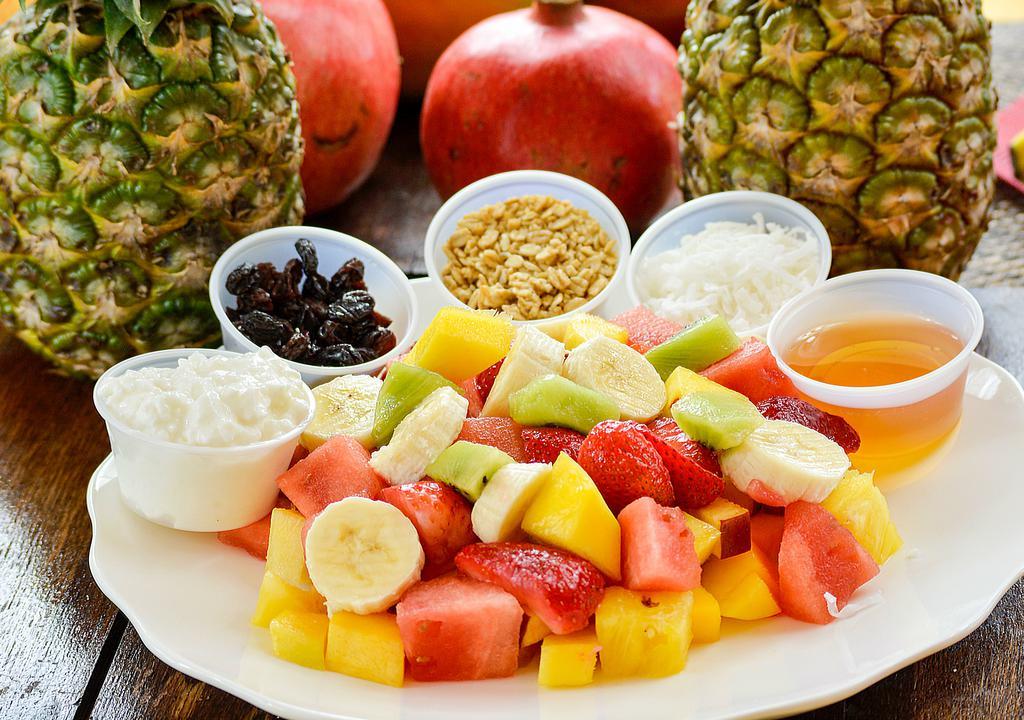 Energy Fruit Salad · Fruit with cottage cheese, granola, coconut, raisins, honey, and seasonal fruit.