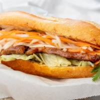 3. Banh Mi - Sandwich · BEEF OR PORK OR CHICKEN:
Vietnamese sandwich with choice of grilled meat, cucumber, and pick...