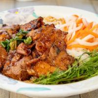 30. Bun Thit Heo Nuong · Vermicelli with grilled meat and vegetables.