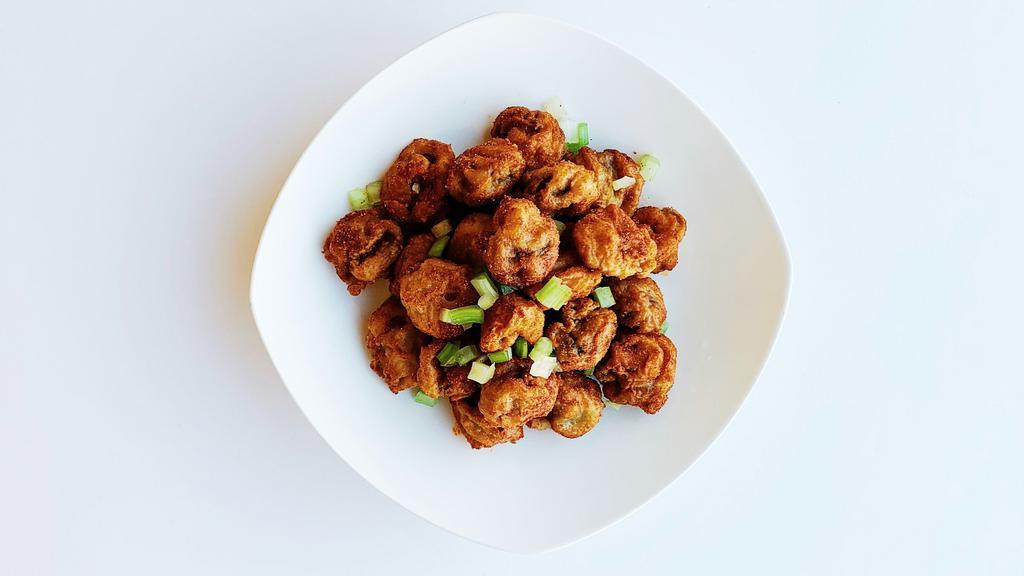 Sichuan Street Mushrooms · Crispy fried button mushrooms tossed w/ chili and cumin seasoning. Very spicy, just like at the night markets. Vegan.