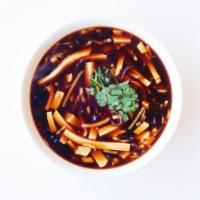 Hot & Sour Soup · Rich, tangy broth w/ tofu and bamboo shoots. Spicy, vegan. Serves 2.