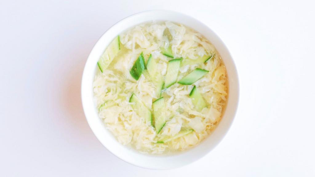 Egg Drop Soup · Light, velvety soup w/ a swirl of fresh egg and cucumbers. Serves 2.