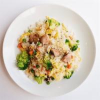 Veggie Fried Rice · Wok-tossed fried rice w/ egg, mushrooms, broccoli, and peas. Eggs optional.