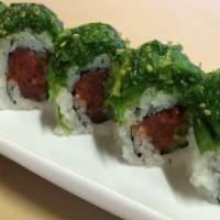 Poki Roll · Spicy tuna, cucumber, seaweed salad