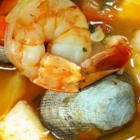 Caldo 7 Mares - 7 Seas · Crab legs, shrimp, clams, octopus, fish, calamari, scallops and vegetables.