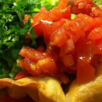 Taco Salad · Served on a flour crispy shell topped choice of meat, rice, whole pinto beans, iceberg lettu...