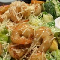 Grilled Shrimp Caesar Salad · Roman lettuce, tossed with Caesar dressing topped with grilled shrimp, parmesan cheese and c...