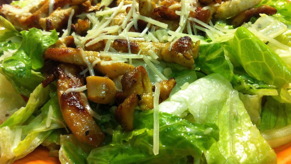 Grilled Chicken Ceasar Salad · Roman lettuce, tossed with Caesar dressing topped with grilled chicken, parmesan cheese and croutons.