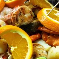 Mariscada · Mixed of shrimp, octopus, fish, crab legs, calamari, clams, and abalone. Prepared with your ...
