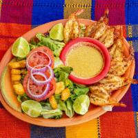 Camarones a La Plancha · Grilled shrimp.