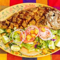 Pescado Frito · Deep fried whole red snapper fish, crispy and tender with your choice of: al mojo de ajo - g...