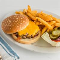 Cheeseburger (¼ Lb.) · 1/3 lb hamburger with a slice of American cheese served with lettuce, tomato, pickle, and ma...