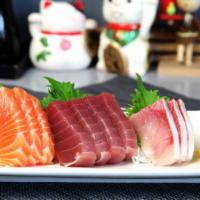 E. Sashimi (10 Pieces) · Tuna, salmon, hamachi.