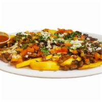 Steak Fries · French fries topped with cheese ,chopped steak ,sour cream, pico de gallo, jalapeños