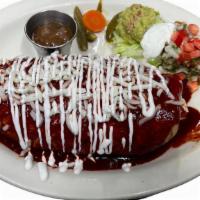 Burrito Mojado · Meat, Rice, Beans, Sour Cream, avocado , cheese,cilantro and onion covered in red sauce, And...