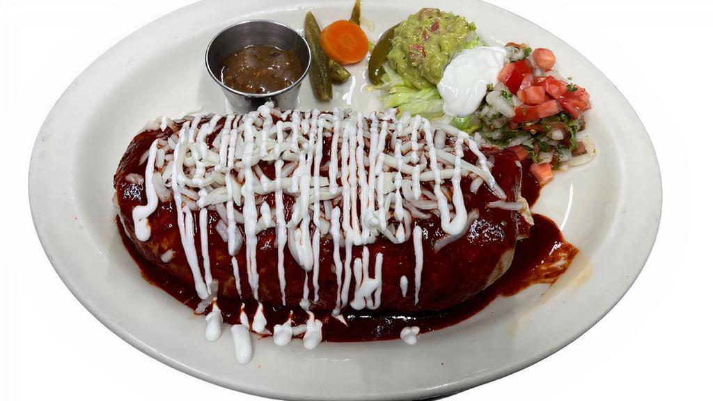 Burrito Mojado · Meat, Rice, Beans, Sour Cream, avocado , cheese,cilantro and onion covered in red sauce, And Melted Cheese