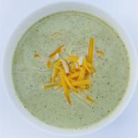Broccoli Soup · Creamy broccoli soup with cheddar cheese. It comes with warm pita bread. Gluten free. (*GF w...