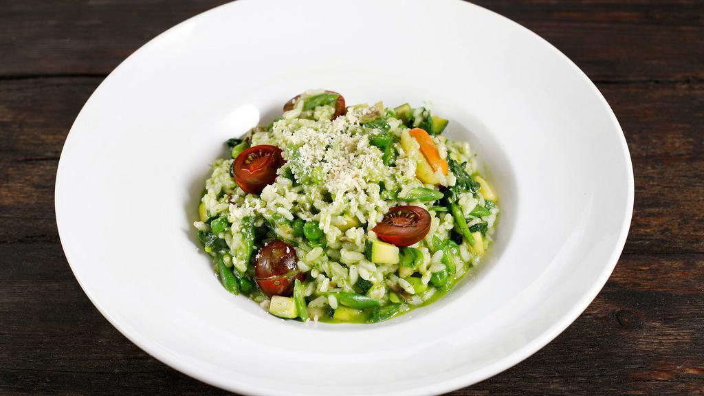 Vegetarian Green Risotto · Risotto with market vegetables, parmesan, mushrooms, English peas, and cherry tomato.