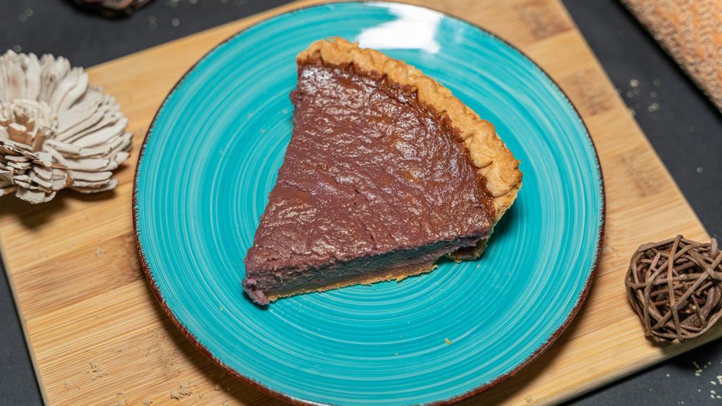 Purple Sweet Potato Pie · Made with organic roasted purple sweet potatoes and a house blend of warming spices, organic butter, local eggs and brown sugar. 9