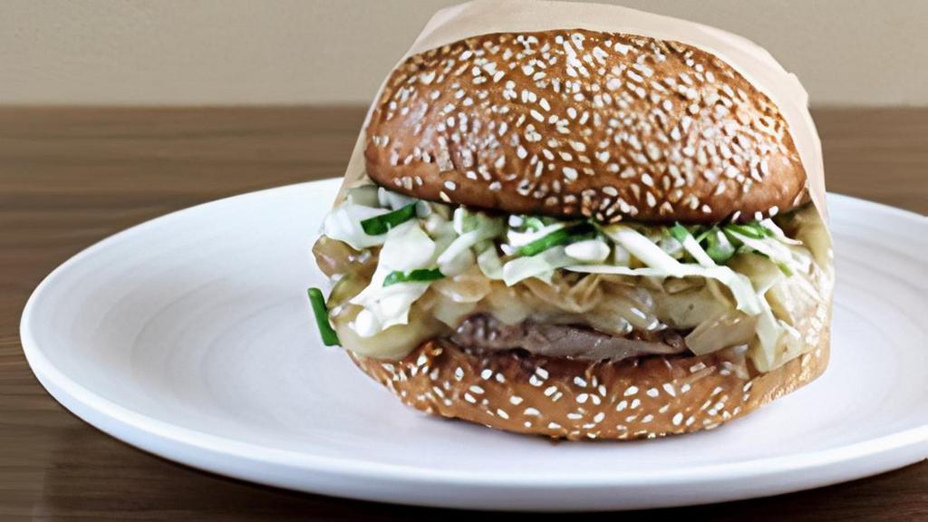 BBQ · Aged White Cheddar, BBQ Sauce, Caramelized Onions, Jalapeno Relish, and Oil & Vinegar Slaw.