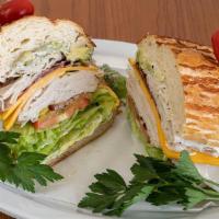 Cali Club · Golden roasted turkey, bacon, avocado, cheddar cheese, with your choice of bread and toppings