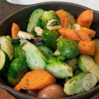 ROASTED VEGETABLES · Roasted potato, Brussel sprouts, zucchini, carrots and garlic with balsamic glaze.