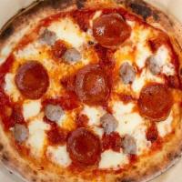MARADONA PIZZA (MEAT LOVERS) · San Marzano tomato sauce, fresh Mozzarella, Sicilian sausage , Pepperoni and Nduja.