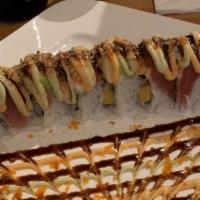 522. House Special Roll · Unagi, mango roll topped with spicy tuna, crab, tuna, salmon, avocado, tobiko and special sa...